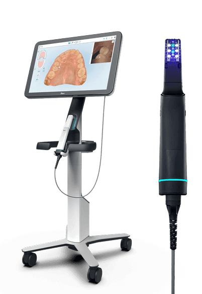 A dental imaging system featuring a monitor displaying a digital mouth scan and a handheld scanner beside it.